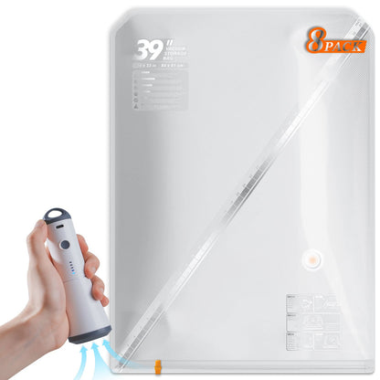 Hand using the Turbo X7 cordless pump to vacuum seal a large 39 inch clear storage bag from an 8 pack