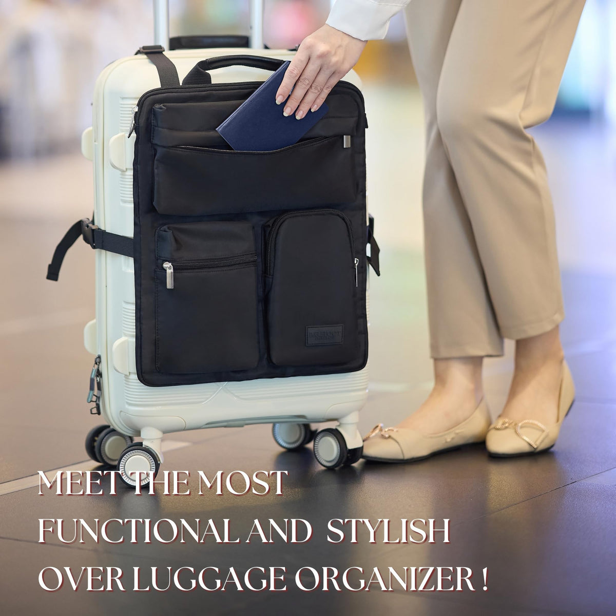 Black over-luggage organizer bag on a carry-on suitcase with a passport tucked into its quick access pocket
